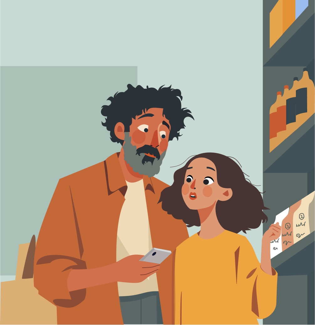 Un père et sa fille consultent un téléphone devant un rayon de magasin